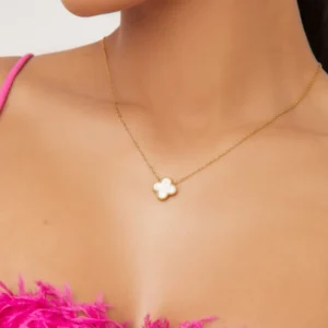 gold chain necklace with white flower pendant