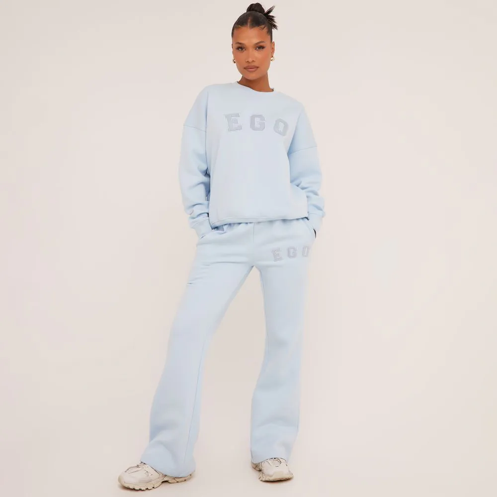 High Waist Ego Graphic Slogan Wide Leg Slouchy Joggers In Baby Blue