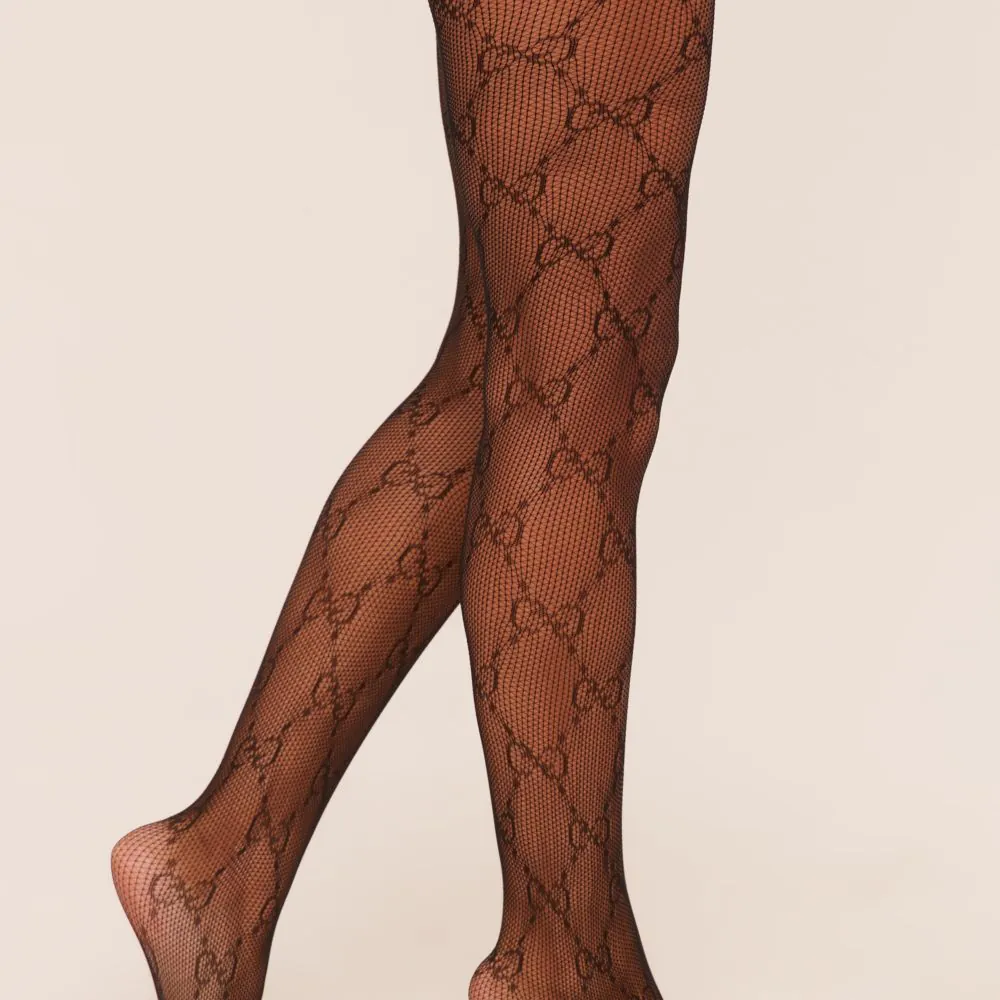 Logo Detail Fishnet Tights In Black