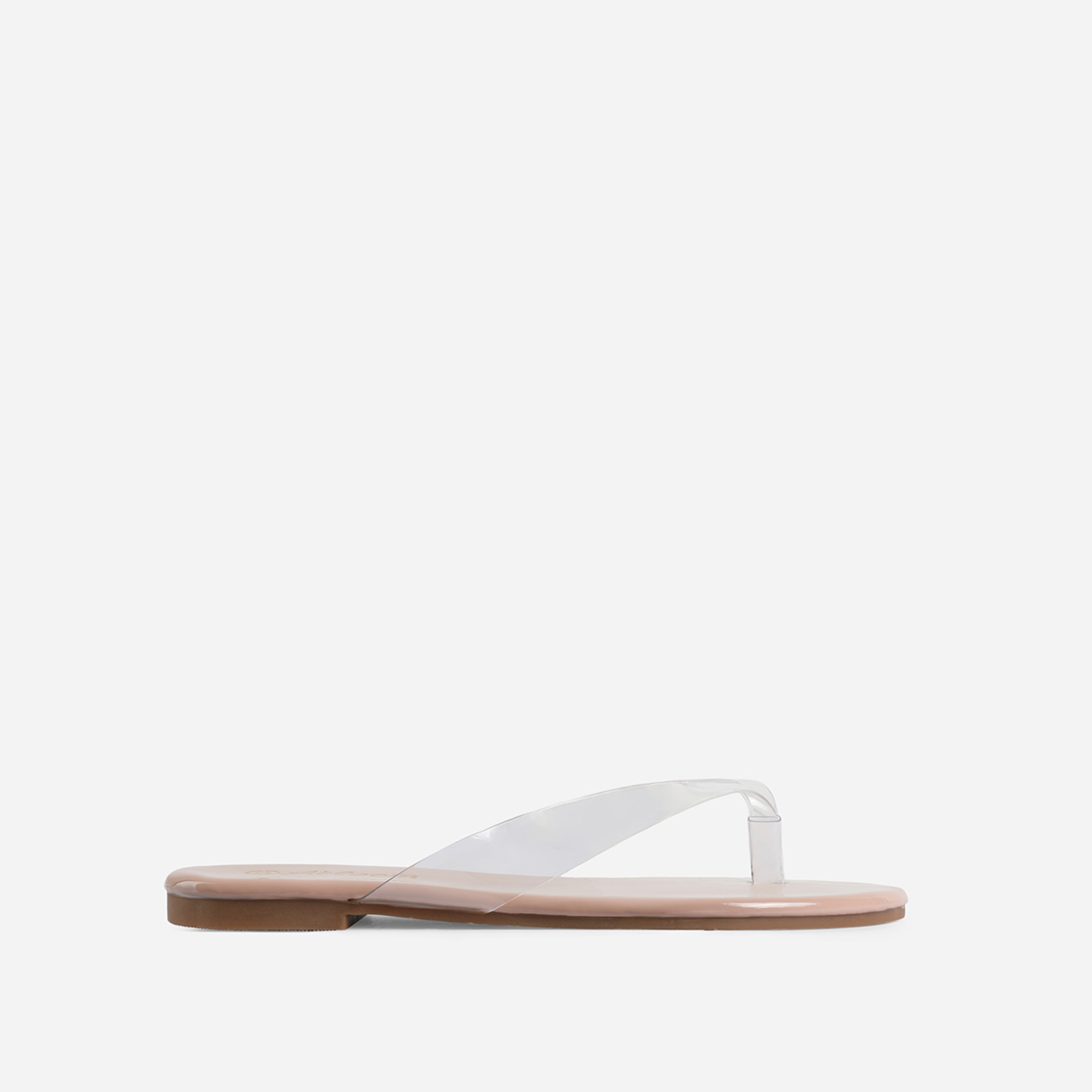 Heat Perspex Thong Flat Sandal In Nude Patent, Nude | EGO | Logo detail ...